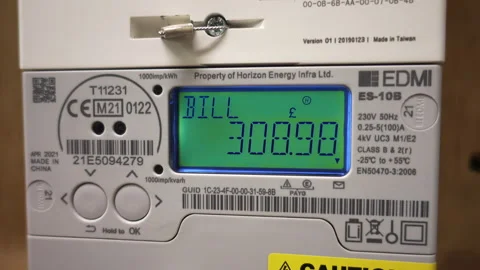 Smart meter display panel showing the high cost of fuel bills. Stock Footage 169248086