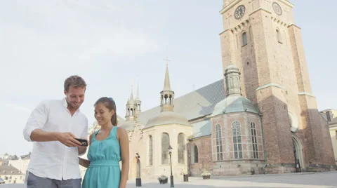 Smart mobile phone couple using smartphone app Stock Footage 50160630