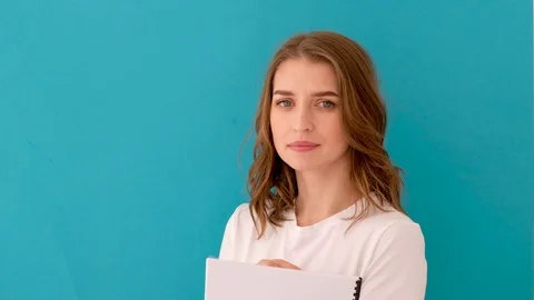 Smart pensive student with notepad pondering Stock Footage 126964173