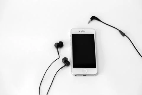 Smart phone and adapter cable Stock Photos