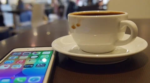 Smart phone and coffee Stock Footage 48722856