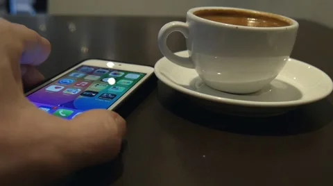 Smart phone and coffee Stock Footage 48723312