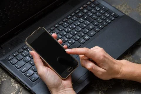 Smart phone and computer for on line payment Stock-Fotos