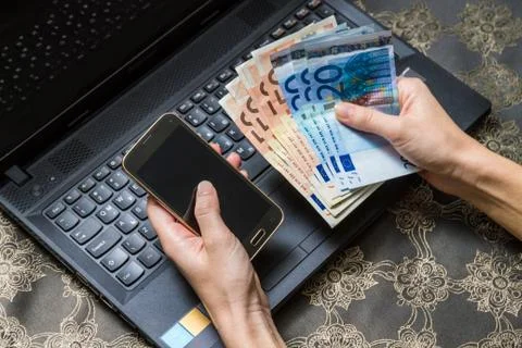 Smart phone and computer for on line payment Stock-Fotos