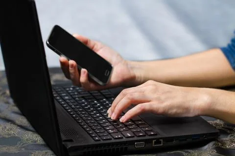 Smart phone and computer for on line payment Stock Photos