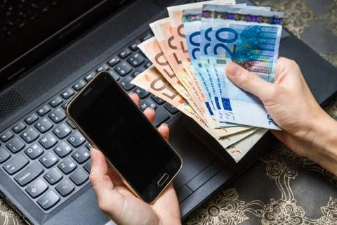 Smart phone and computer for on line payment Foto stock