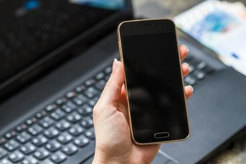 Smart phone and computer for on line payment Stock Photos