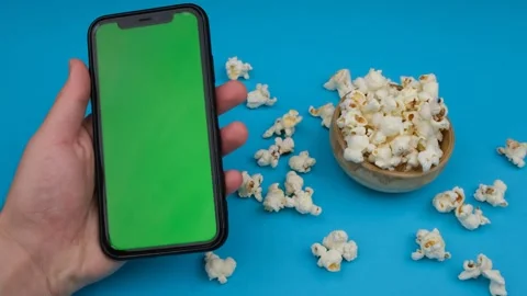 Smart phone and popcorn Stock Footage 260162685