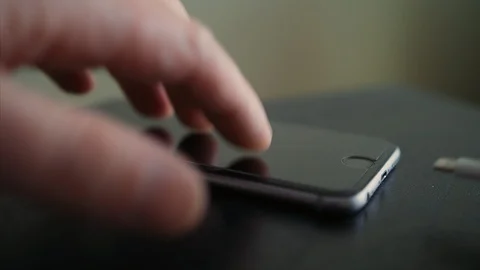 Smart Phone Charging with Cable. Closeup Stock Footage 87581776