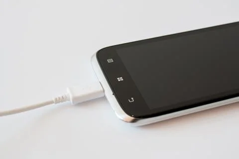 Smart Phone Charging with Cable Stock Photos