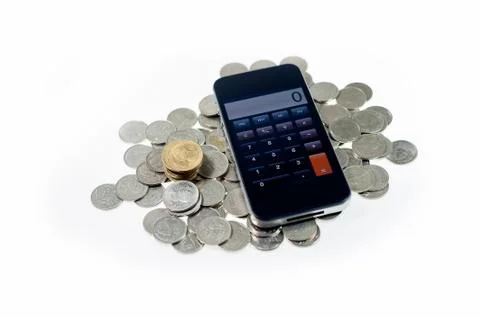 Smart phone with coins on isolate Stock Photos