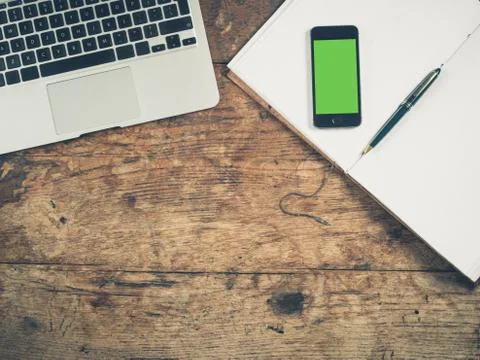 Smart phone concept with notepad and laptop Stock-Fotos
