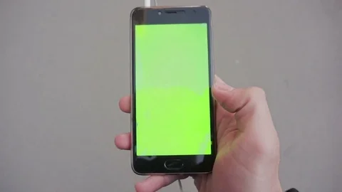 Smart phone with green screen Stock Footage 75688812