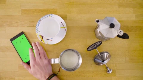 A smart phone with green screen on the table 動画素材 83591811