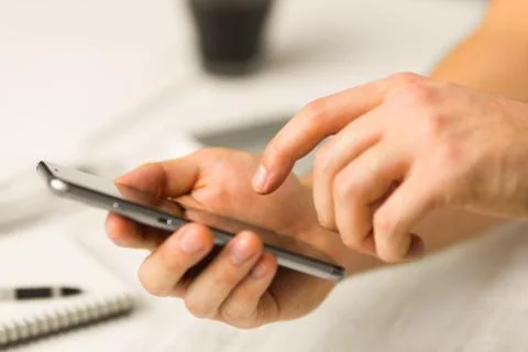 Smart phone hands in Man using smartphone in cafe a touch screen 스톡 사진