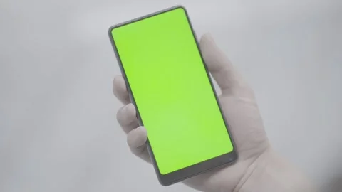 Smart Phone Held By Hands. Green Screen Chroma Key. C Stock Footage 151185671