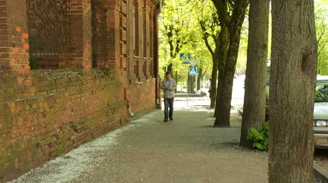Smart phone man calling on mobile phone in city. Stock Footage 63158932