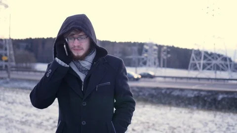 Smart phone man calling on mobile phone at night in city. Handsome young Stock Footage 86136938