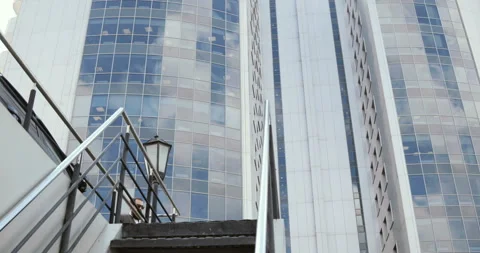 Smart phone man calling on mobile phone at in city. Handsome young business man Stock Footage 91253470