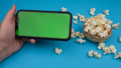 Smart phone popcorn Stock Footage 260162457