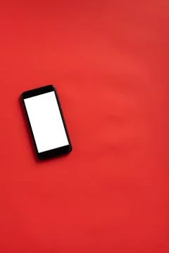 Smart phone on red background Stock Photos