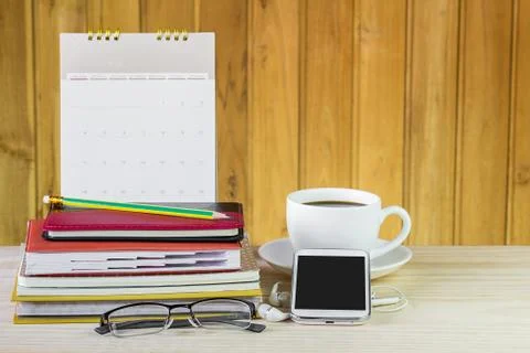 Smart phone,coffee cup,and stack of book Foto stock
