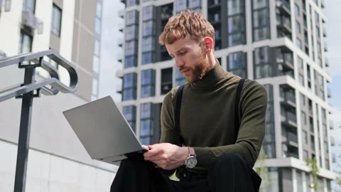 Smart professional startup businessman working remote on laptop typing code job. Stock Footage 222770723