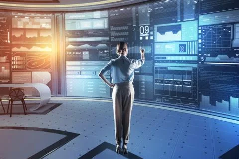 Smart programmer pointing to the screen and noticing good results Stock-Fotos