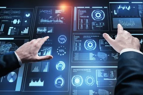 Smart programmer touching the screen while analyzing the diagrams Stock-Fotos