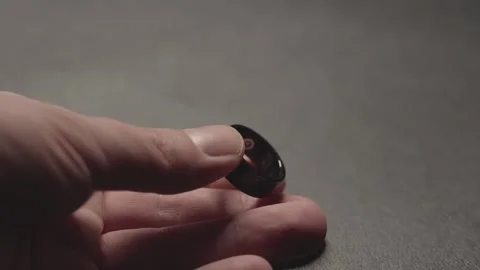 Smart ring flashes a green light that measures heart rate and blood Stock Footage 305666168