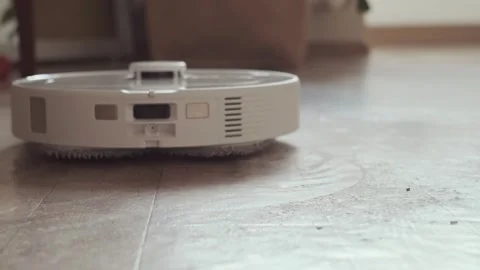 Smart robot makes your home cleaner saving your time and effort with efficient Stock Footage 314641512