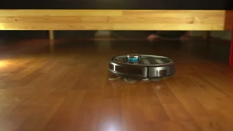 Smart Robot Vacuum Cleaner Cleaning Floor / Smart Home Features Stock Footage 180841981