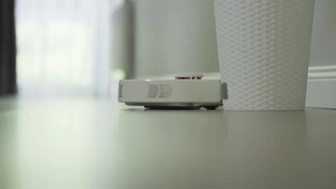 Smart Robot Vacuum Cleaner Efficiently Navigating the Complex Home Space with Video stock 312435565