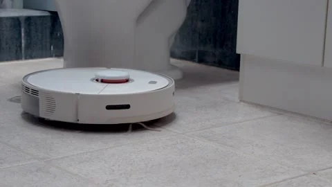 Smart Robotic Vacuum Cleaner for Automated Home Cleaning Stock Footage 338412919