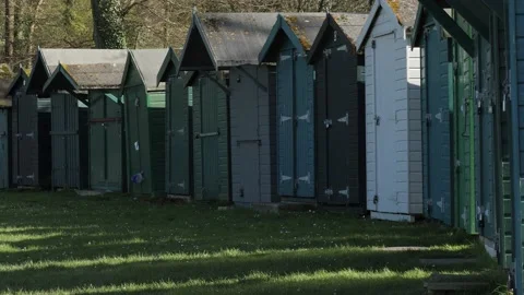 Smart row of beach huts at Appley, Ryde, IOW, 4K Stock Footage 238670251