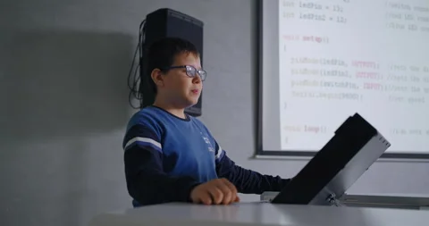 Smart Schoolboy With Eyeglasses Speaking In Classroom, Presentation Of School Stock Footage 280174049