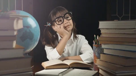 Smart Schoolgirl Studying Process 動画素材 75403135