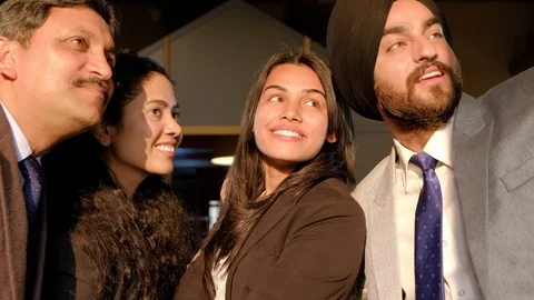 Smart sophisticated and sharp looking business colleagues gather together as the Stock Footage 102360792