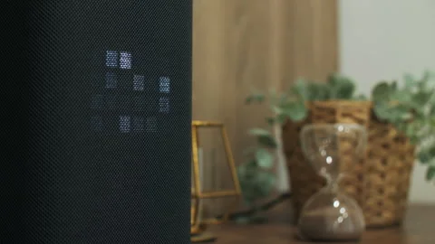 Smart speaker with LED display on home interior table Stock Footage 311278270