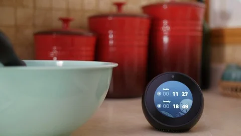 Smart Speaker with Screen Showing Timers and Weather Vídeo Stock 99151320