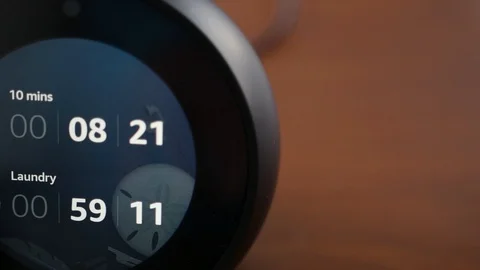 Smart Speaker with Screen Showing Timers Dolly Shot Stock Footage 99520692