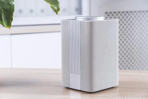 Smart speaker on the table in the room, gadget in the apartment close-up, Stock Photos