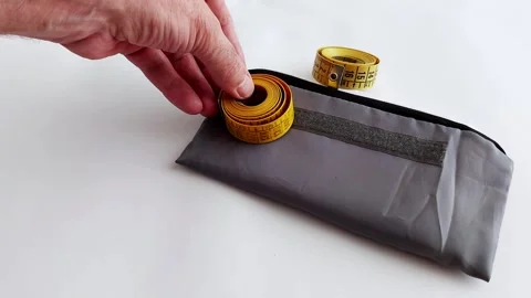 Smart Storage for Measuring Tapes: Quick Easy Method Video stock 313117338