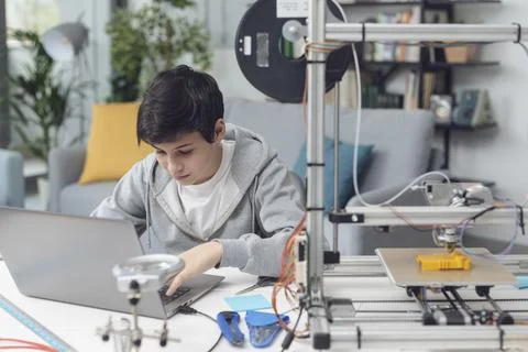 Smart student learning 3D printing at home Stock Photos