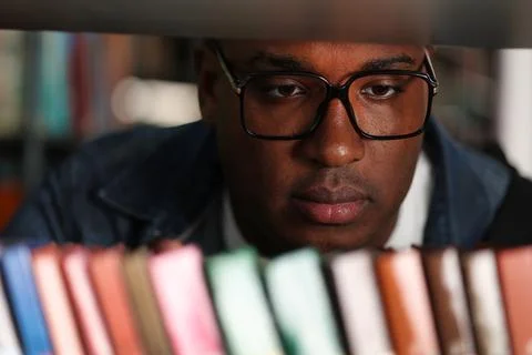 Smart student preparing to enter university, studying professional literature Stock Photos