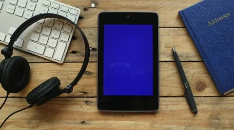 Smart tablet on table Stock Footage 63432596