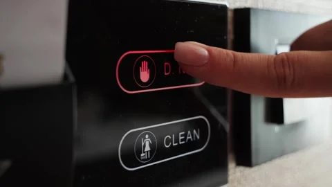 Smart touch system in hotel rooms, where a guest can press from inside the room Stock Footage 320558731