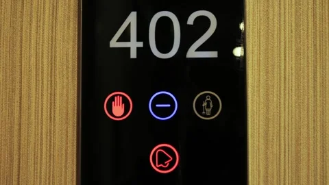 Smart touch system in hotel rooms, where a guest can press from inside the room Video stock 323442605
