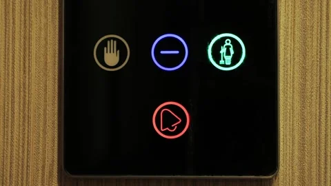 Smart touch system in hotel rooms, where a guest can press from inside the room Stock Footage 325075408