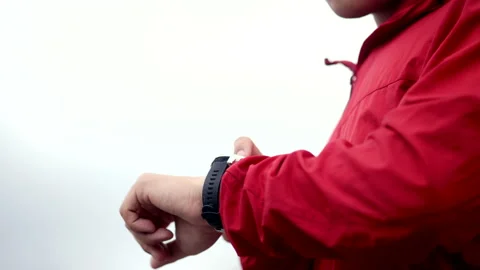 Smart trail runner man checking smart watch on rocky mountain. Athlete jog. Stock Footage 171498722